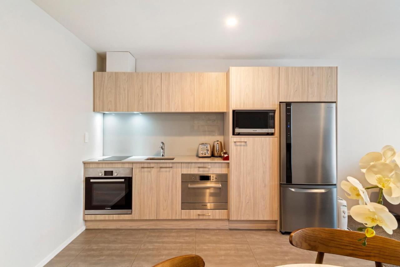 Fernz Motel & Apartments Birkenhead Auckland Exterior photo A typical kitchen in a residential apartment